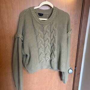 green cable knit sweater